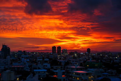 Aerial view of city during sunset