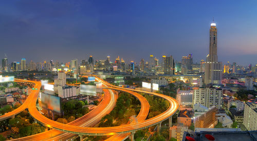 High angle view of city buildings against sky