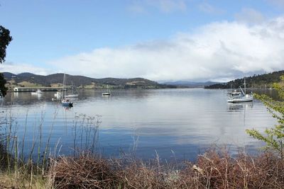 Boats in calm lake