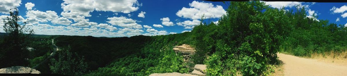 Scenic view of landscape against cloudy sky