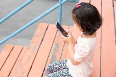 Young woman using mobile phone