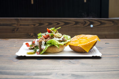 Close-up of fruits in plate on table