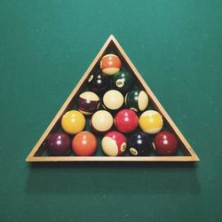 Close-up of multi colored balls on billiards table