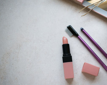 High angle view of make-up brushes on table