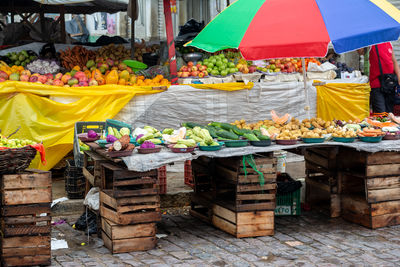  a market stall with fruits and vegetables for sale in the city of santo amaro in bahia.