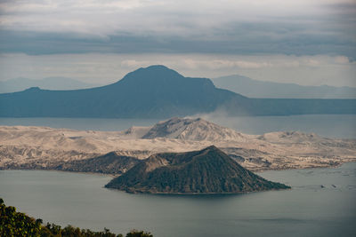 Panoramic view of volcanic mountain range against sky