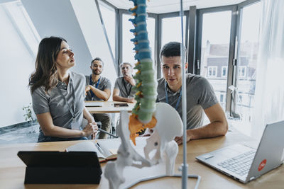 Group of people working on table