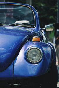 Close-up of blue car headlight