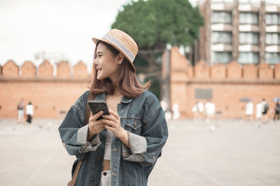 Young woman looking at camera