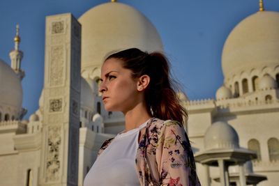 Low angle view of woman against the sky