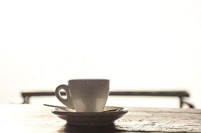 Close-up of coffee cup on table