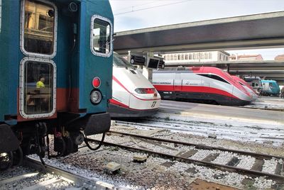 Train on railroad tracks against sky