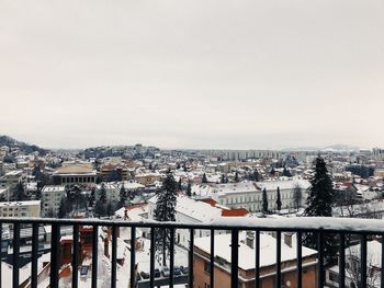 High angle view of buildings in city during winter