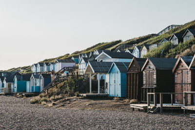 Beach huts against sky