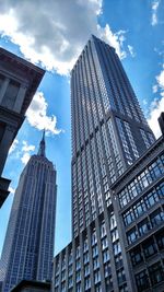Low angle view of skyscrapers against sky