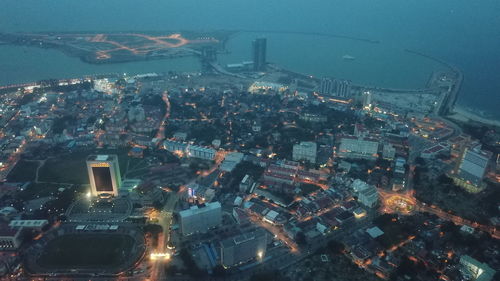 High angle view of illuminated buildings in city