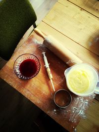 Close-up of coffee cup on wooden table