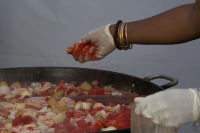 Close-up of woman preparing food