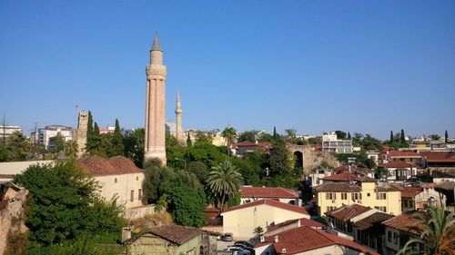 Town in city against clear sky