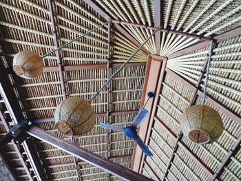 High angle view of wicker basket hanging from ceiling