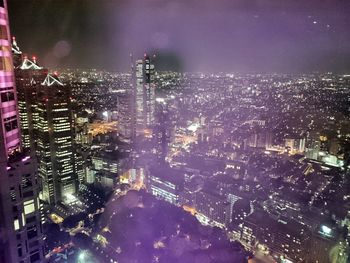 Aerial view of illuminated cityscape