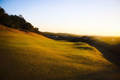 Scenic view of landscape against sky during sunset