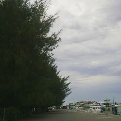 Road against cloudy sky