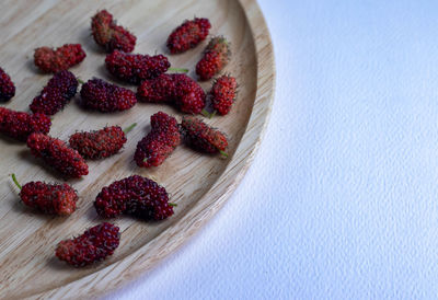 High angle view of strawberries on table