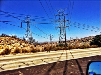 Electricity pylon against sky