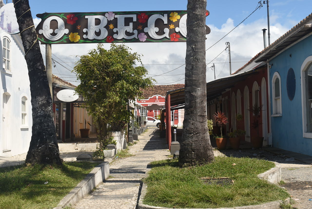 ROAD LEADING TOWARDS BUILT STRUCTURE