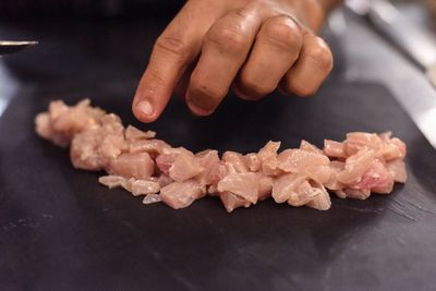 Close-up of hand holding ice cream