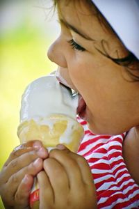 Close-up of man eating food