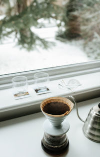 High angle view of coffee cup on table