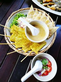 Close-up of served food in plate on table