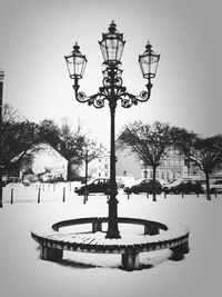 Street light against sky