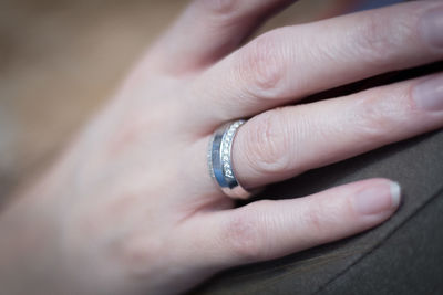 Close-up of couple holding hands