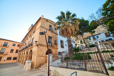 Low angle view of buildings against clear sky