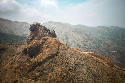 Scenic view of rocky mountains against sky