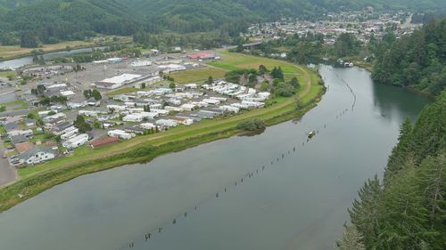 High angle view of river amidst buildings in city