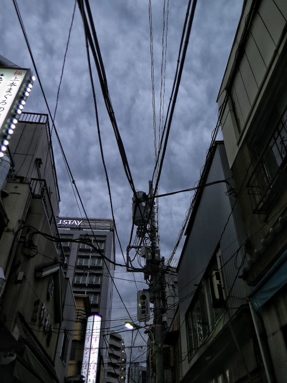 LOW ANGLE VIEW OF POWER LINES AGAINST SKY