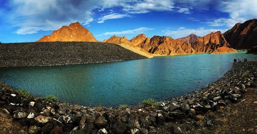 Scenic view of sea against cloudy sky