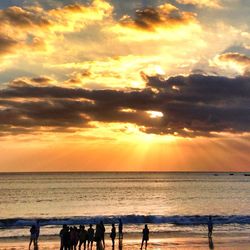 Scenic view of sea at sunset