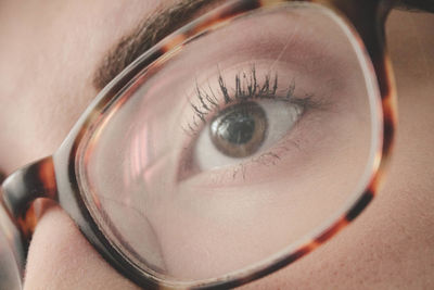 Close-up of young woman in eyeglasses