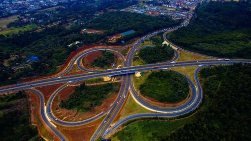 High angle view of winding road on landscape