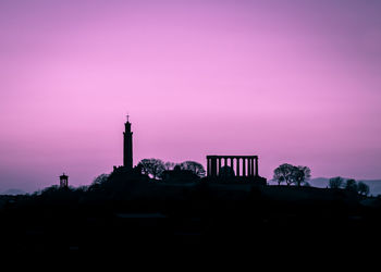 Silhouette of tower at sunset