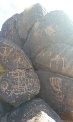 Close-up of wall against sky