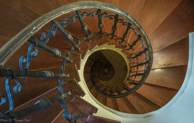 Directly below shot of spiral staircase in building