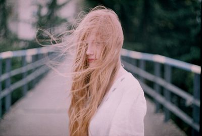 Woman with long hair outdoors