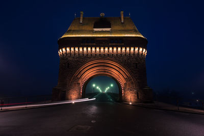 View of illuminated bridge at night