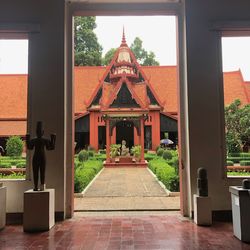 Entrance of temple against building